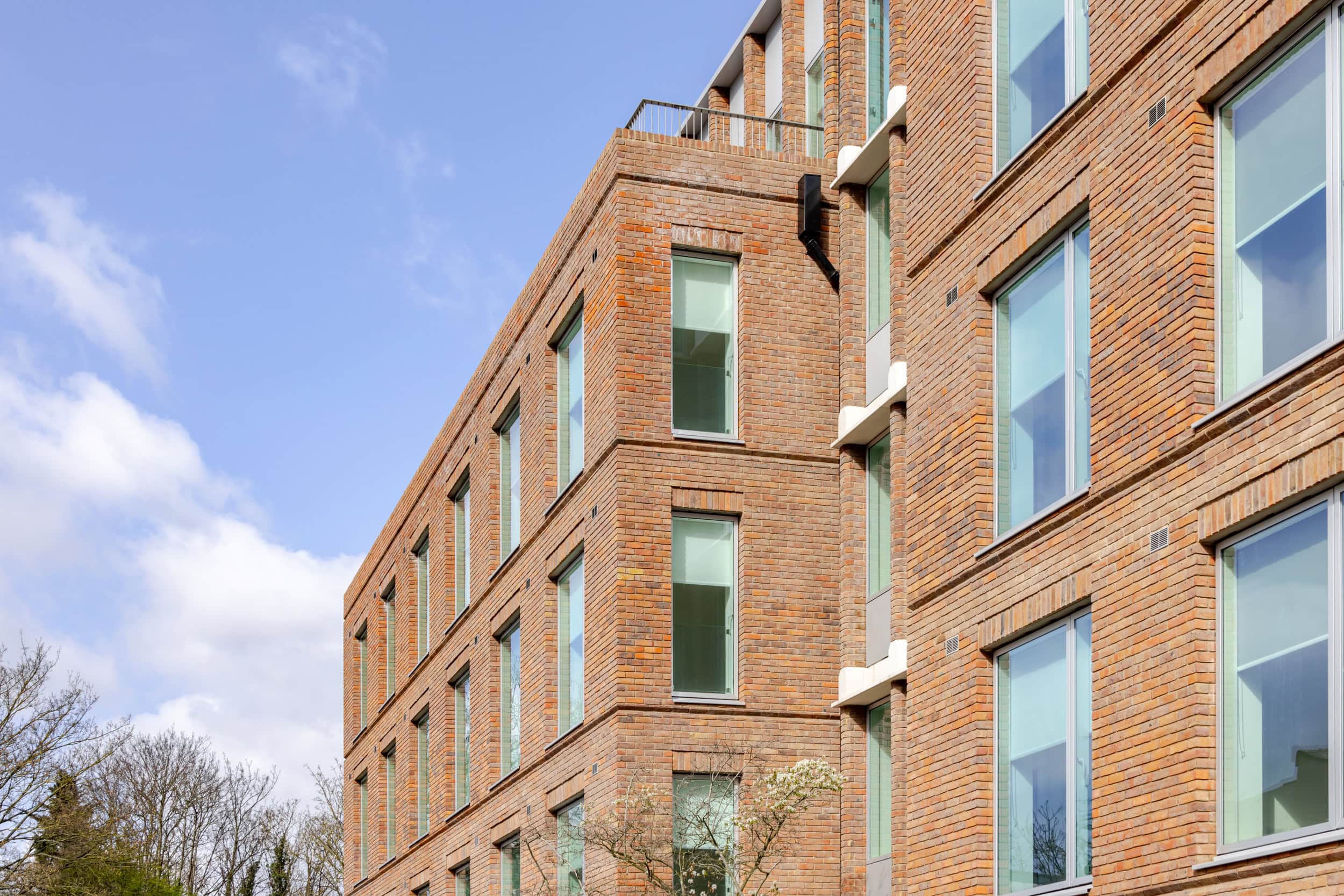 Modern brick building exterior at Leon House The Heights.