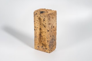 Close-up of a brick made with lower-carbon manufacturing methods.